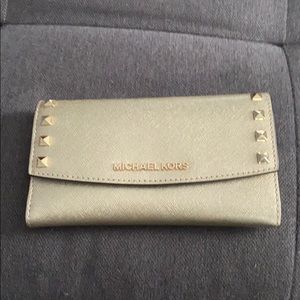 Gold Micheal Kors trifold wallet